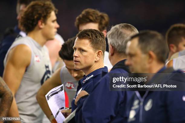 Blues head coach Brendon Bolton speaks to his team during a quarter time break during the round 17 AFL match between the St Kilda Saints and the...