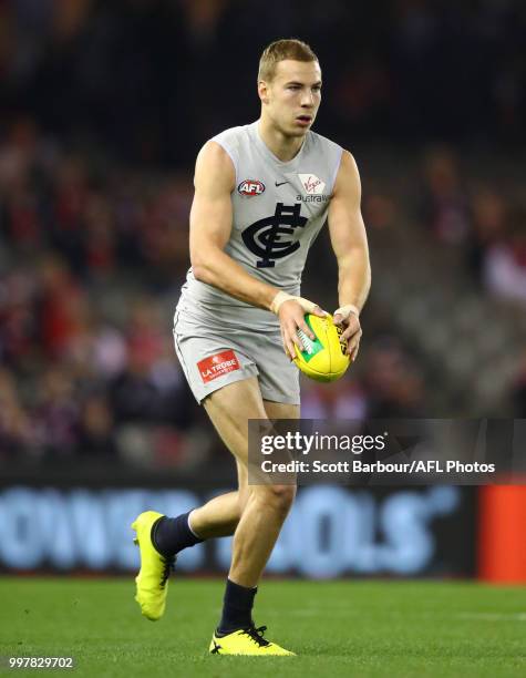 Harry McKay of the Blues runs with the ball during the round 17 AFL match between the St Kilda Saints and the Carlton Blues at Etihad Stadium on July...