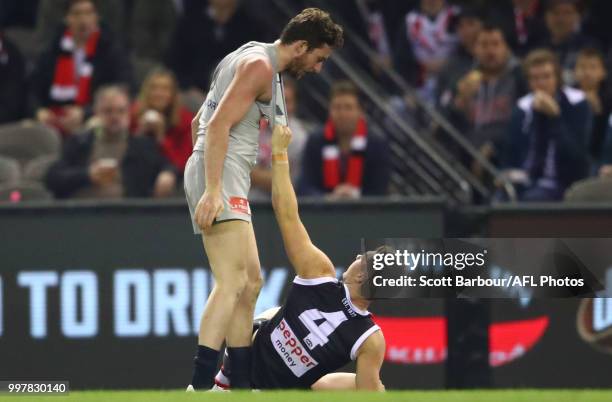 Jed Lamb of the Blues and Jade Gresham of the Saints wrestle in the second quarter during the round 17 AFL match between the St Kilda Saints and the...