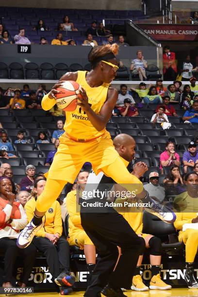 Essence Carson of the Los Angeles Sparks grabs the ball against the Dallas Wings on July 12, 2018 at STAPLES Center in Los Angeles, California. NOTE...