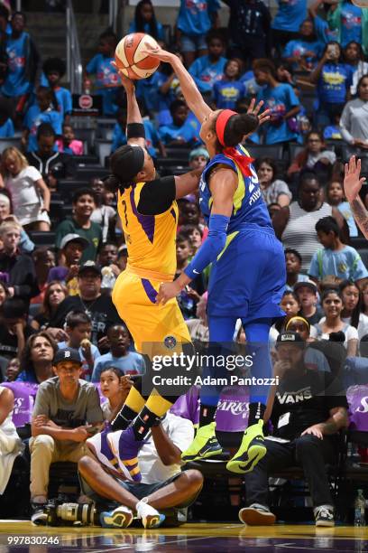 Aerial Powers of the Dallas Wings blocks a shot against Odyssey Sims of the Los Angeles Sparks on July 12, 2018 at STAPLES Center in Los Angeles,...