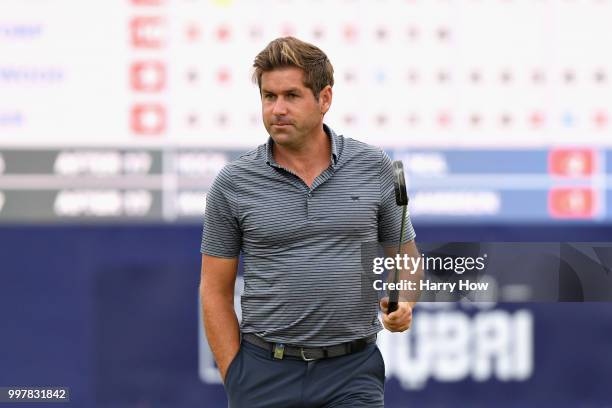 Robert Rock of England reacts to his par putt on hole eighteen during day two of the Aberdeen Standard Investments Scottish Open at Gullane Golf...