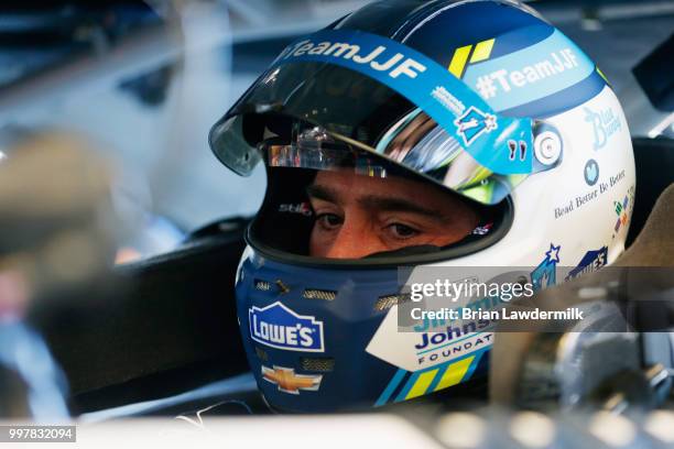 Jimmie Johnson, driver of the Lowe's/Jimmie Johnson Foundation Chevrolet, sits in his car during practice for the Monster Energy NASCAR Cup Series...