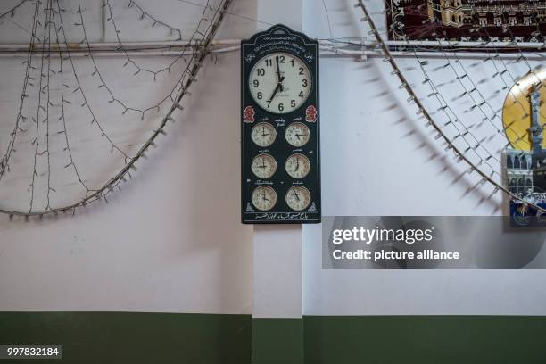 Clock is hanging in the provisonal mosque Masjid Dar Ul Aman in Athens, Greece, 6 July 2017. The first mosque in the capital of Greece is still being...