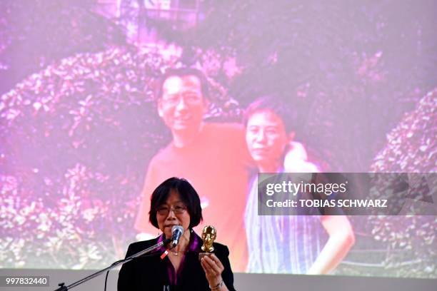 Chinese writer Tienchi Martin Liao addresses a commemoration for Chinese dissident and Nobel Peace Prize laureate Liu Xiaobo in Berlin on July 13,...