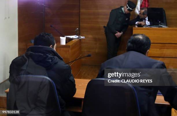 Chilean priest Oscar Munoz Toledo remains at a courtroom in Rancagua, 80 km south of Santiago, Chile, on July 13, 2018. - Prominent Chilean Catholic...