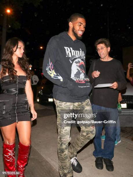 Karl-Anthony Towns and Kawahine Andrade are seen on July 12, 2018 in Los Angeles, California.