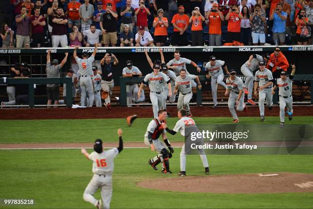 The Oregon State Beavers celebrate winning the national title against the Arkansas Razorbacks during the Division I Men's Baseball Championship held...