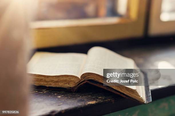 old book on windowsill - trust god stock pictures, royalty-free photos & images