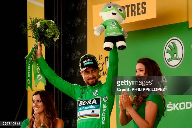 Slovakia's Peter Sagan, wearing the best sprinter's green jersey, celebrates on the podium after the seventh stage of the 105th edition of the Tour...