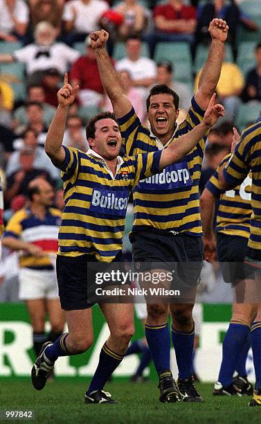 Chris Malone and Bredan Cannon of Sydney University celebrate after University defeated Eastwood 27-20 to win the Sydney Club Rugby Premiership at...