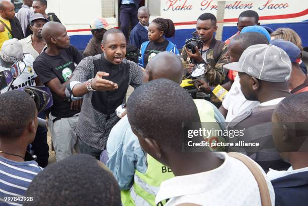 Political activist Boniface Mwangi explains his plans to his potential voters in Nairobi, Kenya, 12 June 2017. The son of a street hawker hopes to...