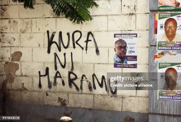 Picture of a graffiti on a wall warning muslims not to take part in the coming Parliamentary elections with the slogan "Kura ni Haramu" , taken in...