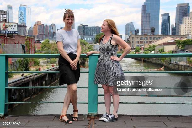 Ute Zimmermann and Katarina Jerinic are standing at the Gowanus channel in New York, United States, 25 June 2017. A dirty, toxic channel is running...