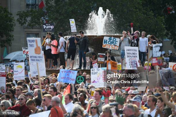 Protesters take part in a demonstration against President Trump's visit to the UK in Trafalgar Square on July 13, 2018 in London, England. Tens of...