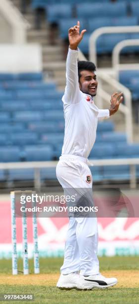 Mehidy Hasan Miraz of Bangladesh celebrates the dismissal of Miguel Cummins of West Indies during day 2 of the 2nd Test between West Indies and...
