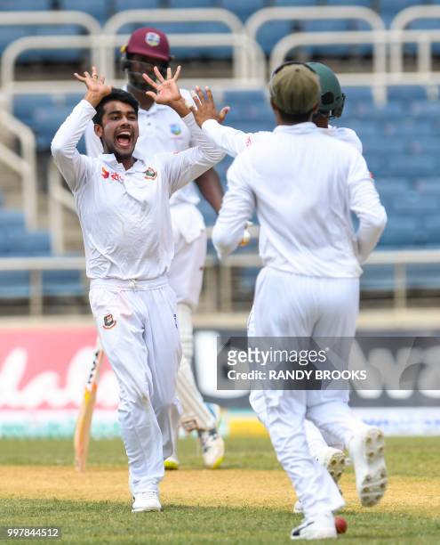 Mehidy Hasan Miraz of Bangladesh celebrates the dismissal of Miguel Cummins of West Indies during day 2 of the 2nd Test between West Indies and...