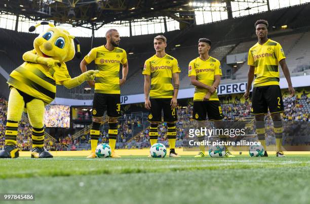 Mascot Emma presenting Dortmund new recruits Omer Toprak , Maximilian Philipp, Mahmoud Dahoud and Dan-Axel Zagadou during the Borussia Dortmund team...