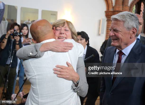 July 2018, Berlin, Germany: The first death anniversary of Nobel Peace Prize recipient Liu Xiaobo sees former federal president Joachim Gauck and his...