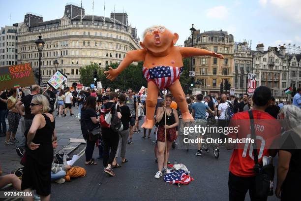 Protesters take part in a demonstration against President Trump's visit to the UK in Trafalgar Square on July 13, 2018 in London, England. Tens of...