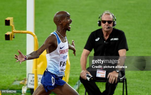 Mohammed "Mo" Farah from Great Britain celebrates his victory at the 10,000 meter run at the 2017 London World Championships in Athletics at the...