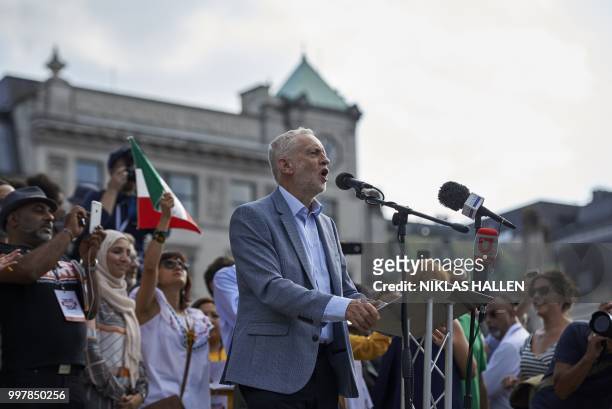 Britain's opposition Labour Party leader Jeremy Corbyn addresses the crowd in Trafalgar Square as protesters against the UK visit of US President...