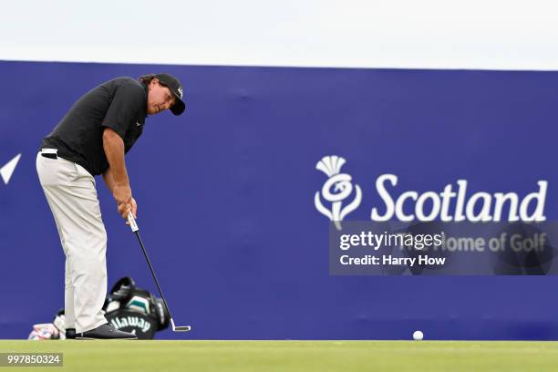 Phil Mickelson of USA putts on hole eighteen during day two of the Aberdeen Standard Investments Scottish Open at Gullane Golf Course on July 13,...