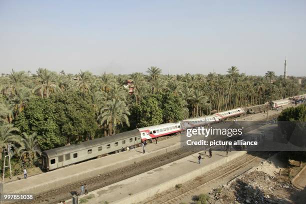 Dpatop - A general view of the scene where a passenger train derailed near Badrasheen, Giza, Egypt, 13 July 2018. At least 55 people were injured as...