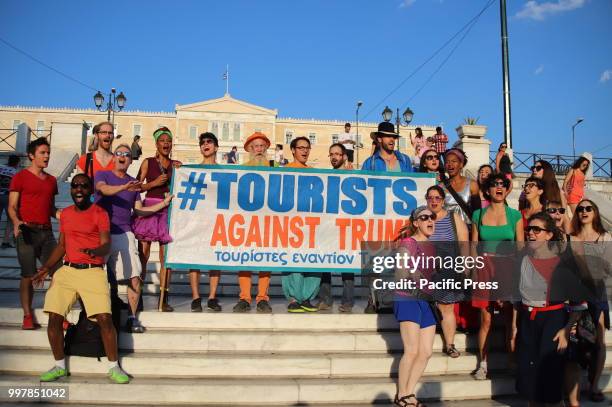 Reverend Billy together with the Stop Shopping Choir performed in Syntagma Square as part of the 'Tourists Against Trump' act.