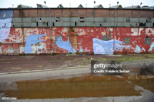 Mural painting and graffitis in the shipyards of Gdansk. Former workshops of the shipyards of Gdansk on October 14, 2015 in Gdansk, Poland.