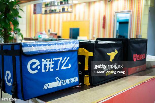 The takeout boxes are placed on the counter of a restaurant. Ele.me,Meituan.com and Waimai.baidu, are China's three major takeout brands. Data show...