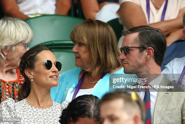 Pippa and James Matthews on centre court on day eleven of the Wimbledon Championships at the All England Lawn Tennis and Croquet Club, Wimbledon.