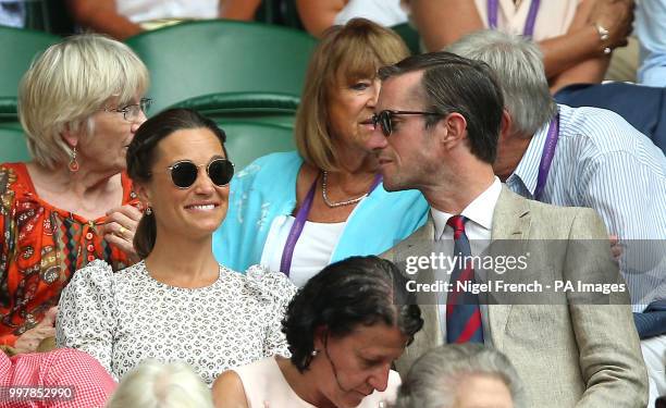 Pippa and James Matthews on centre court on day eleven of the Wimbledon Championships at the All England Lawn Tennis and Croquet Club, Wimbledon.