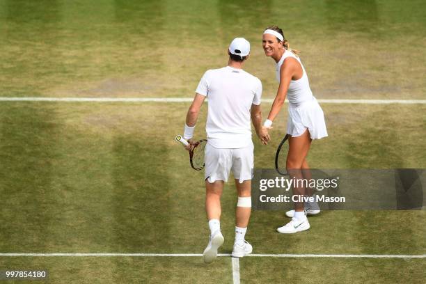 Jamie Murray of Great Britain and Victoria Azarenka of Belarus celebrate a point against Jay Clarke and Harriet Dart of Great Britain during their...