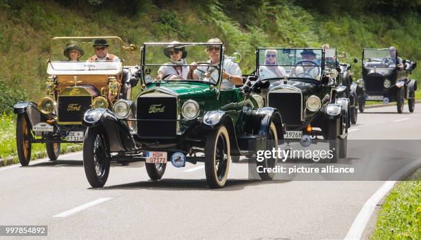 Several Ford Model T driving through a street during the large classic car ride near to Bad Teinach-Zavelstein, Germany, 05 August 2017. Photo:...