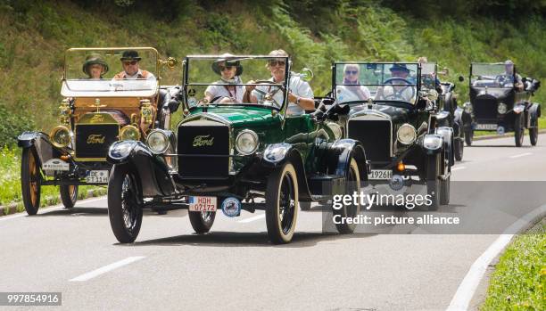 Dpatop - Several Ford Model T driving through a street during the large classic car ride near to Bad Teinach-Zavelstein, Germany, 05 August 2017....