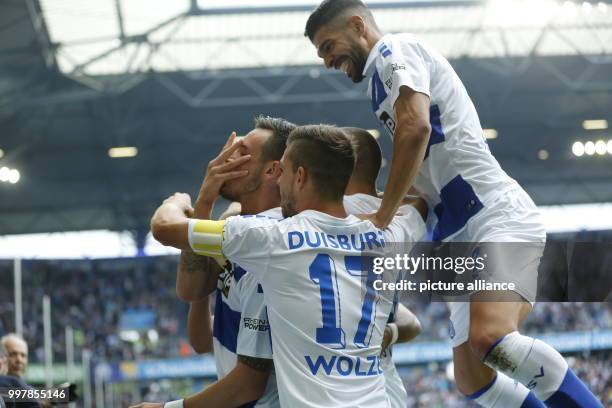 Duisburg's Borys Taschtschi , Kevin Wolze and Enis Hajri celebrating the 1:0 during the 2nd Bundesliga match pitting MSV Duisburg vs VfL Bochum at...