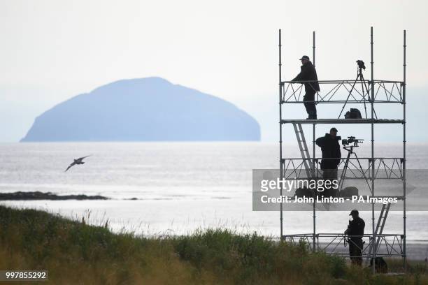 Police scan the golf course at Trump Turnberry resort in South Ayrshire, backdropped by Ailsa Craig island, as the US President Donald Trump is...
