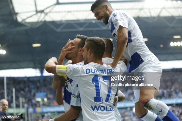 Duisburg's Borys Taschtschi , Kevin Wolze and Enis Hajri celebrating the 1:0 during the 2nd Bundesliga match pitting MSV Duisburg vs VfL Bochum at...