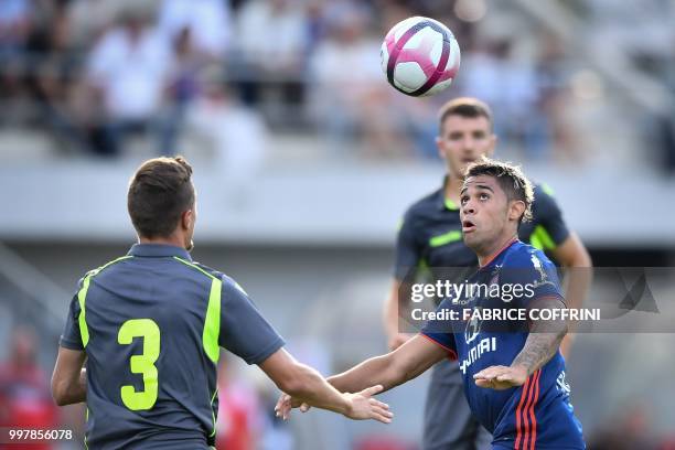 Lyon's Spanish forward Mariano Diaz heads a ball during the friendly football match between FC Sion and Olympique Lyonnais on July 13, 2018 at the...