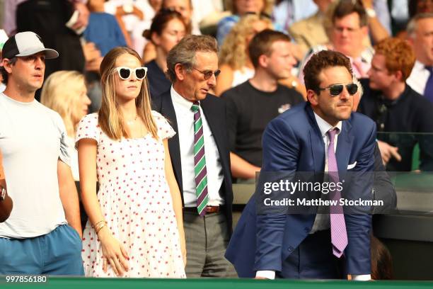 Madison McKinley and Justin Gimelstob watch the Men's Singles semi-final match between John Isner of The United States and Kevin Anderson of South...