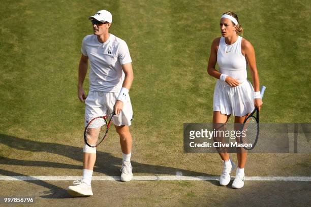 Jamie Murray of Great Britain and Victoria Azarenka of Belarus look on during their Mixed Doubles semi-final match against Jay Clarke and Harriet...
