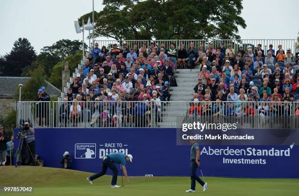 Justin Rose of England and Rickie Fowler of USA finish their round at 18 green during the second day of the Aberdeen Standard Investments Scottish...