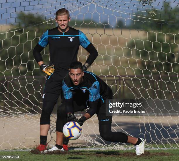 Marius Adamonis and Thomas Strakosha in action during the SS Lazio training session on July 13, 2018 in Rome, Italy.