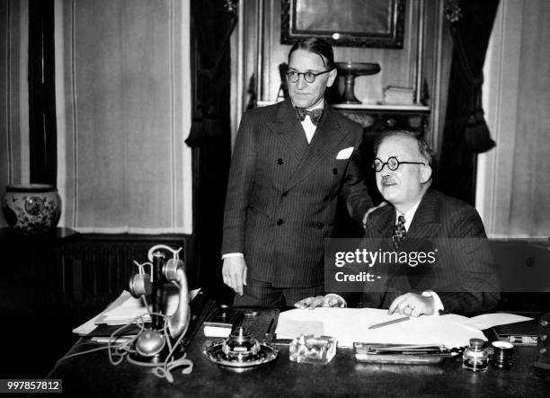 César Campinchi, French lawyer and statesman, is standing next to Vincent Auriol, French statesman and Minister of Justice, on January 21, 1938...