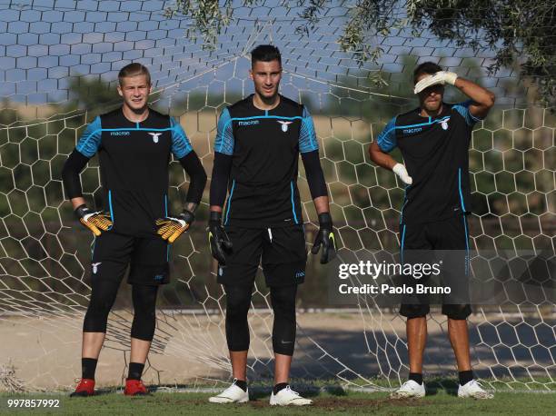 Marius Adamonis, Thomas Strakosha and Guido Guerrieri look on during the SS Lazio training session on July 13, 2018 in Rome, Italy.