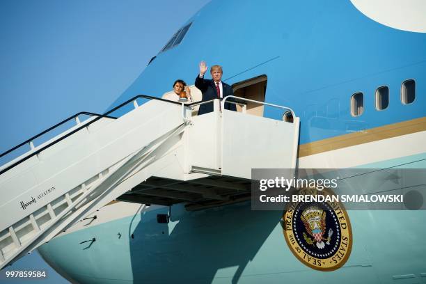 President Donald Trump and US first lady Melania Trump board Air Force One at London Stansted Airport in Stansted on July 13 the second day of...