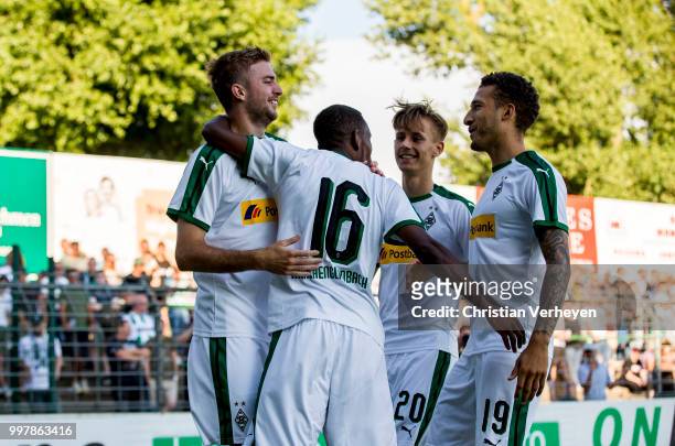 Christoph Kramer of Borussia Moenchengladbach celebrate his teams second goal with his team mates during the preseason friendly match between VfB...