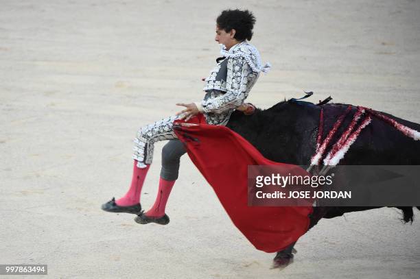 Spanish matador Andres Roca Rey is tossed by a Jandilla fighting bull during a bullfight of the San Fermin festival in Pamplona, northern Spain on...