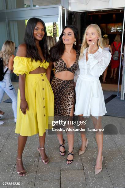 Models Jasmyn Wilkins, Anne de Paula and Vita Sidorkina attend the 2018 Sports Illustrated Swimsuit Casting Call at PARAISO during Miami Swim Week at...